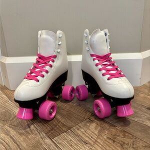 Like new Pink and White girls roller skates